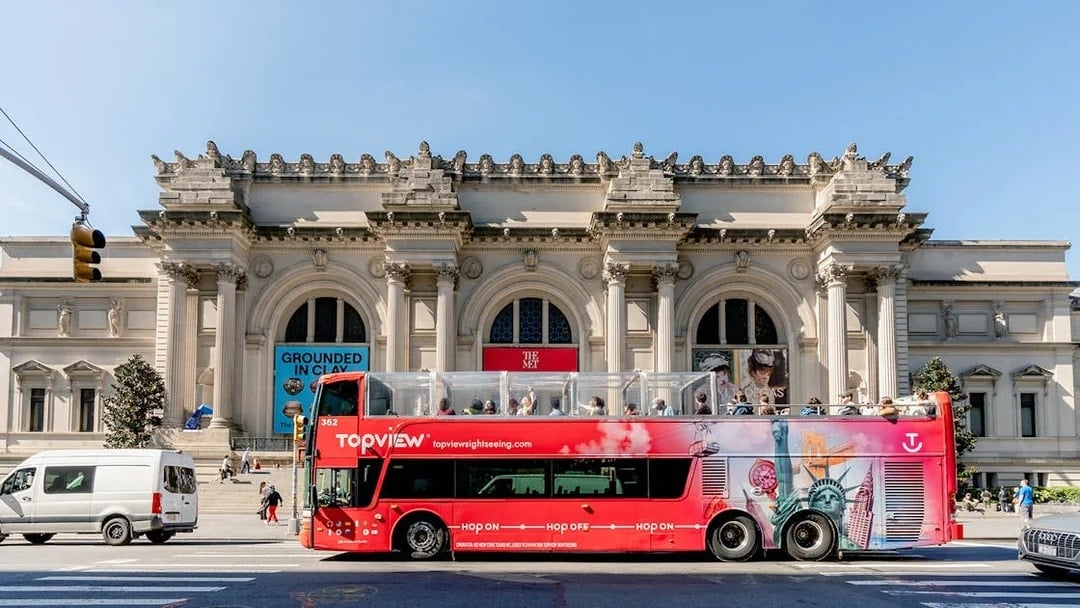 Hop On Hop Off bus in front of The Met, New York City.