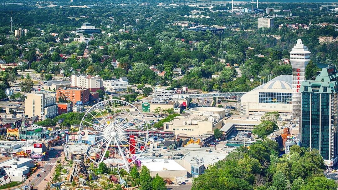 Aerial view of Clifton Hill, Ontario, featuring a Ferris wheel and surrounding attractions.