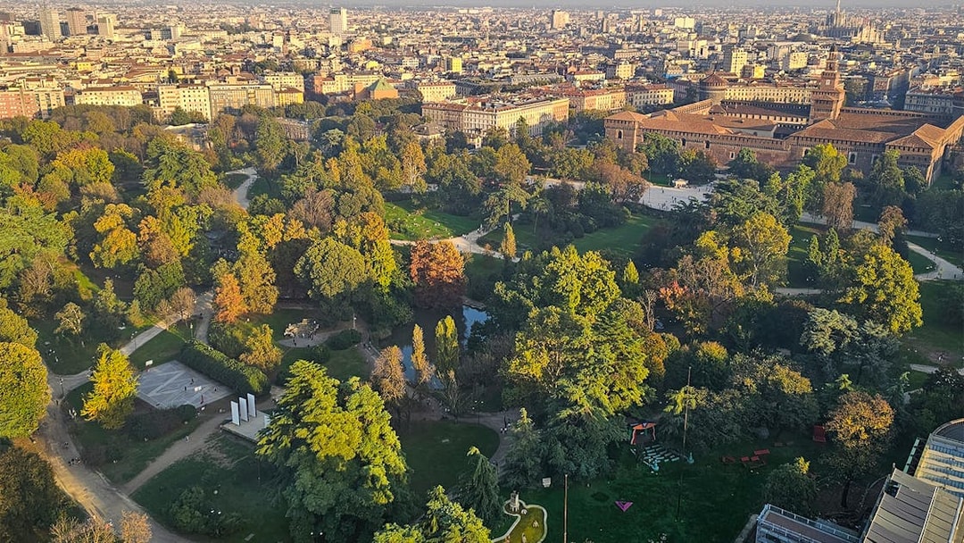 Aerial view of Sforza Castle and lush park in Milan, Italy.