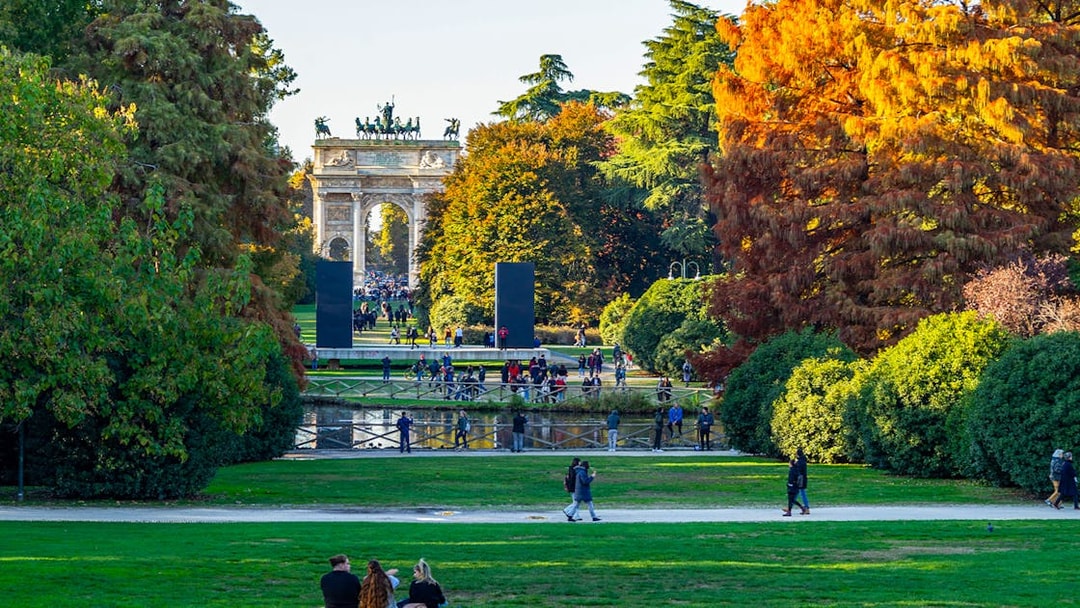 Parco Sempione in Milan during autumn with Arco della Pace in the background, Italy.