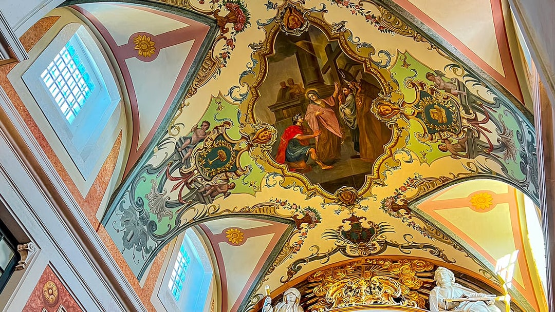 Ceiling fresco and sculptures inside St. George's Castle Church tower, Lisbon.