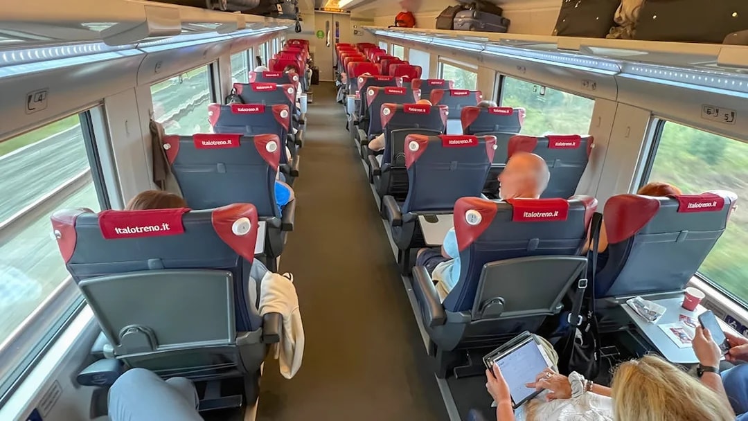 Passengers seated in Italo high-speed train from Florence to Rome.