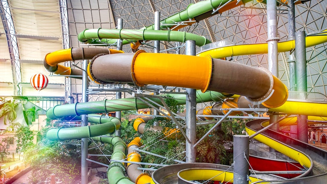 Colorful water slides at Tropical Islands Resort, Germany.