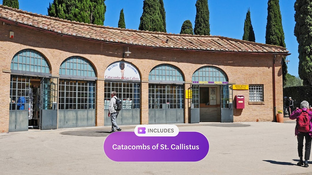 Entrance to Catacombs of San Callisto in Rome with visitors outside.
