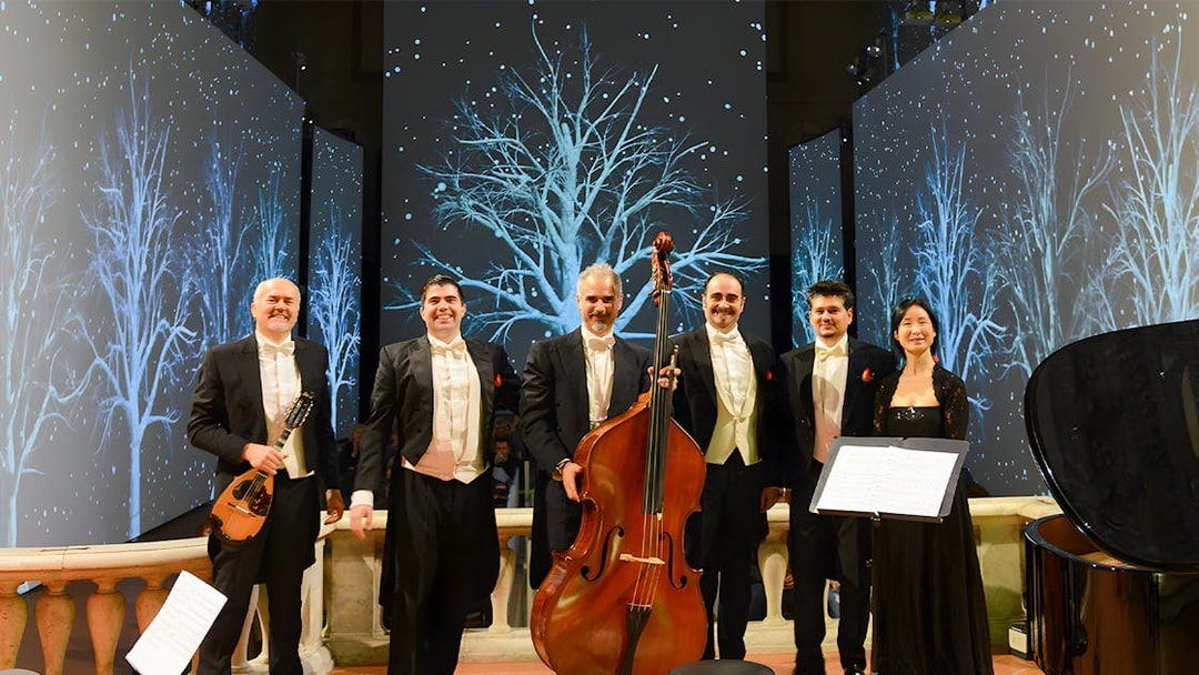 Musicians with instruments on stage for Tuscan Dinner and Three Tenors Concert in Florence.