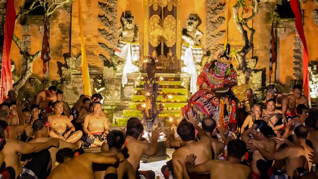 Kecak and Fire Dance performance at Ubud Peliatan Palace, Bali, with dancers in traditional attire.