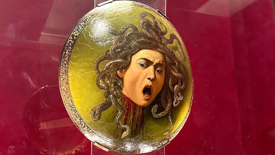 Shield featuring Medusa's head displayed in Uffizi Gallery, Florence.