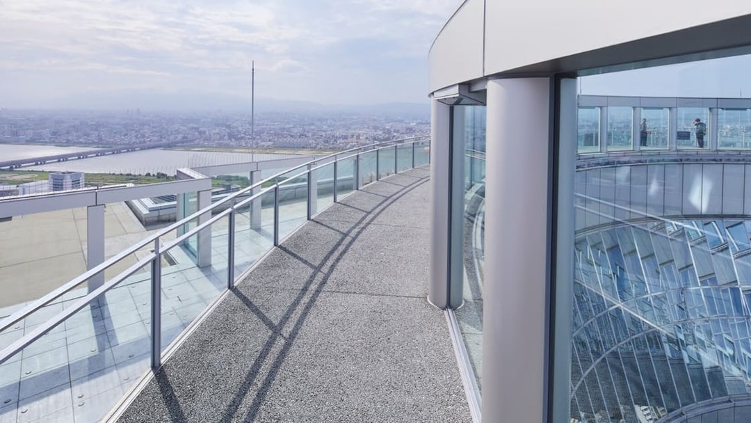 Observation deck view at Umeda Sky Building, Osaka, overlooking cityscape and river.