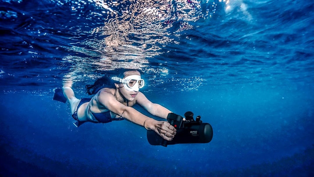 Person using an underwater scooter in Saint-Jean-Cap-Ferrat, Nice, France.