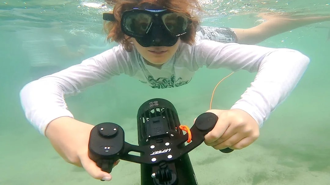 Person using underwater scooter in Saint-Jean-Cap-Ferrat, Nice, France.