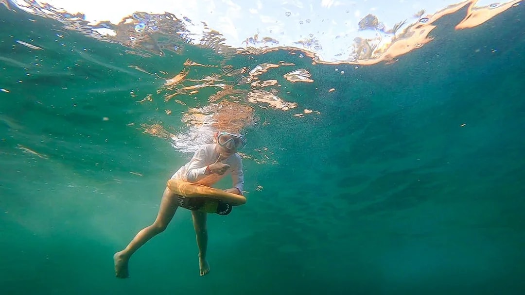 Person using underwater scooter in Saint-Jean-Cap-Ferrat, Nice, France.
