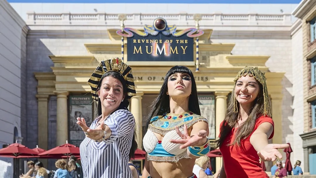 Visitors in Egyptian costumes at Revenge of the Mummy attraction, Universal Studios Orlando.