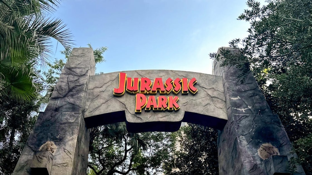 Entrance archway to Jurassic World – The Ride at Universal Studios Hollywood.