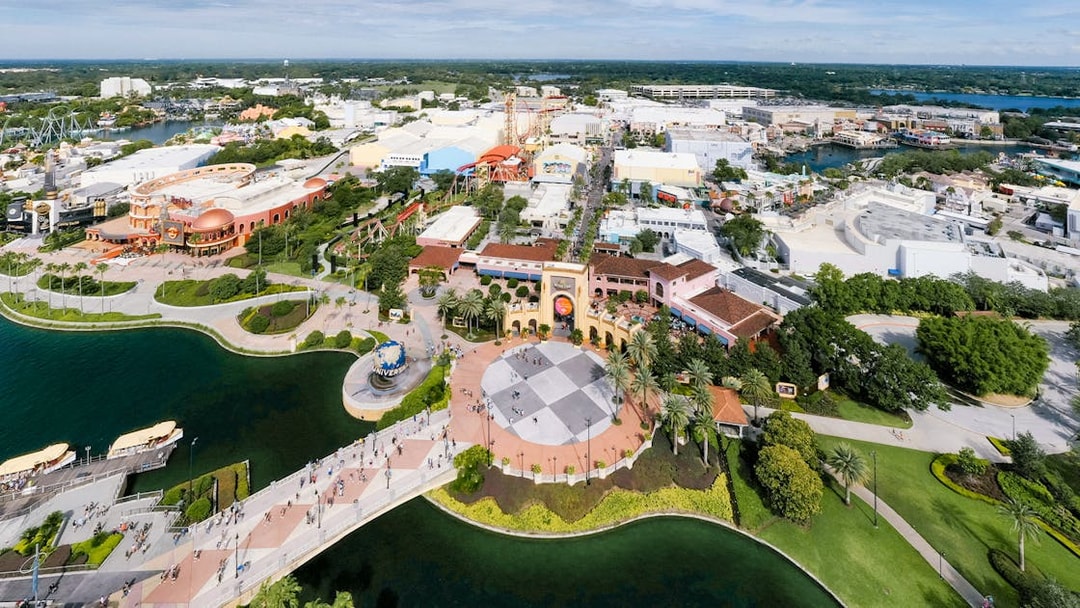 Aerial view of Universal Orlando with theme park attractions and surrounding landscape.