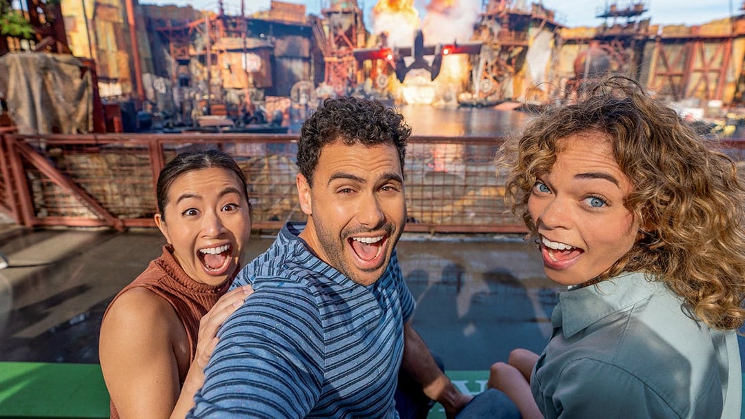 Visitors enjoying a live action show with explosions at Universal Studios Hollywood.