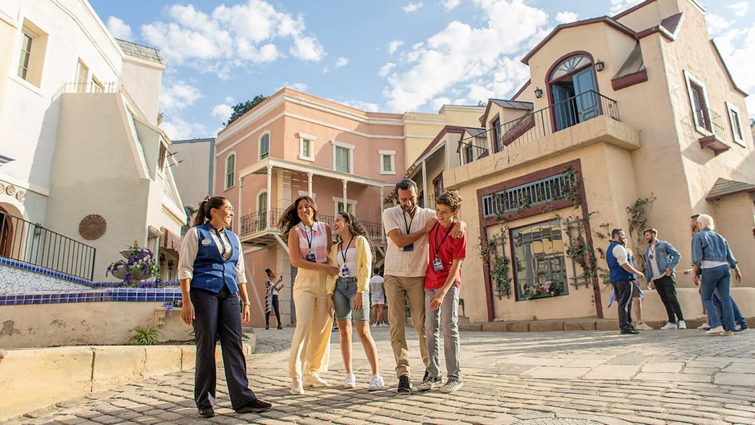 Visitors exploring a themed street at Universal Studios Hollywood.