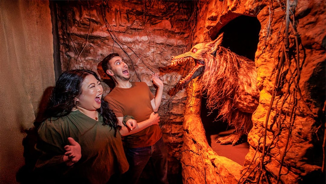 Guests reacting to a werewolf at Hollywood Horror Nights, Universal Studios Hollywood, Los Angeles.
