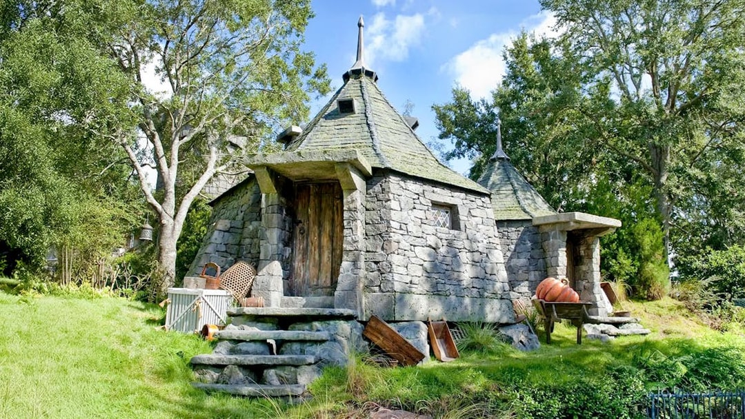 Hagrid's stone hut with pumpkins at Universal Studios Orlando Harry Potter attraction.