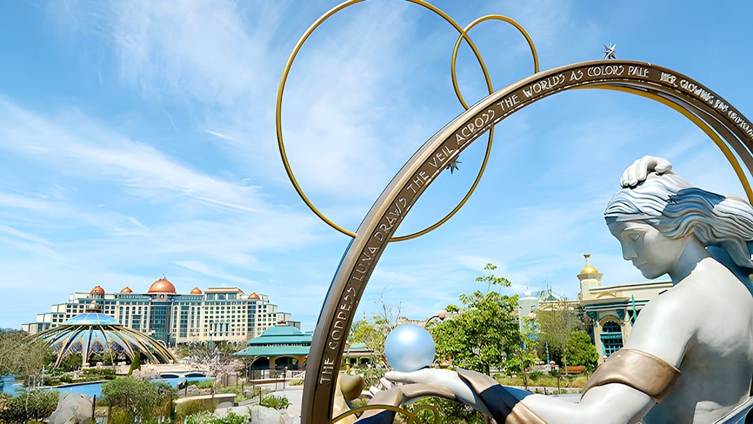 Goddess Luna statue with celestial arch at Epic Universe, Universal Orlando, Florida.