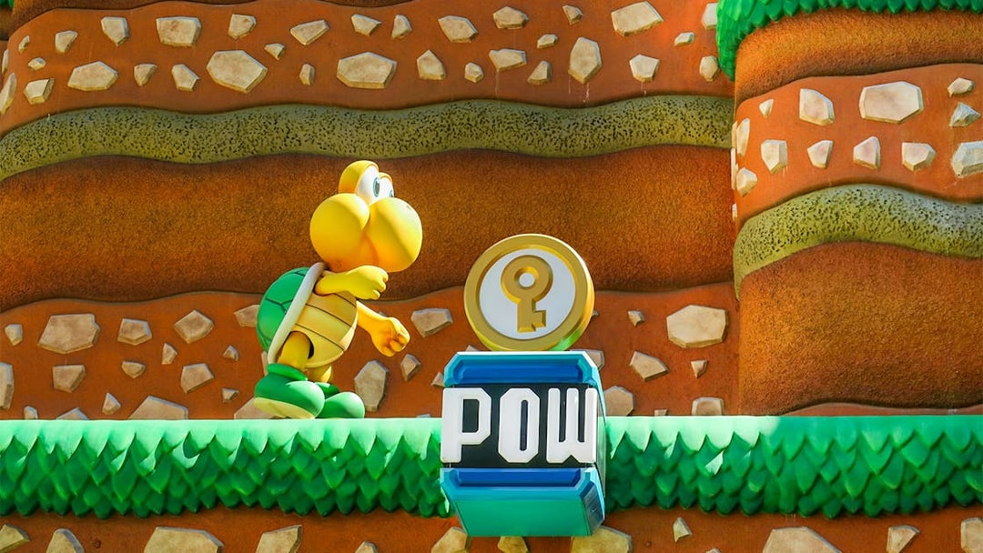 Koopa Troopa character and POW block at Super Mario World, Universal Orlando, Florida.