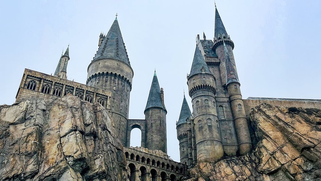 Hogwarts castle at Universal Studios Orlando, featuring stone towers and rocky landscape.