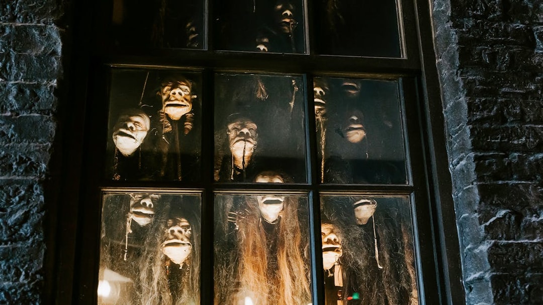 Shrunken heads in a window at The Wizarding World of Harry Potter, Diagon Alley, Orlando.