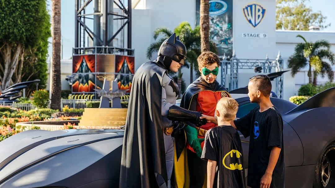 Batman and Robin greet children at Warner Bros Movie World, Gold Coast.