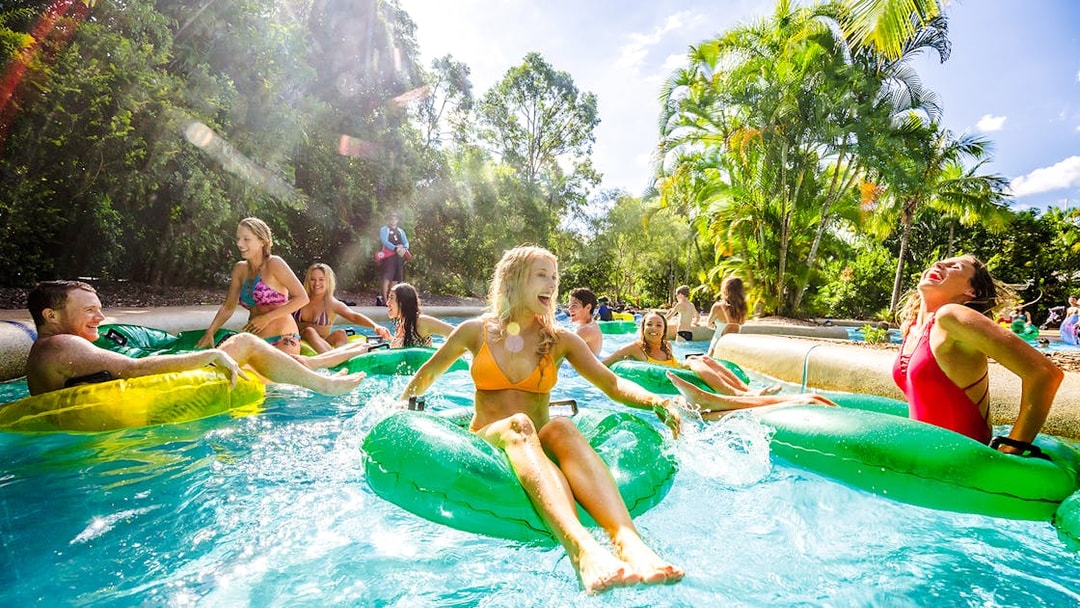 People enjoying a lazy river ride at Calypso Bay, Wet n Wild, Gold Coast.
