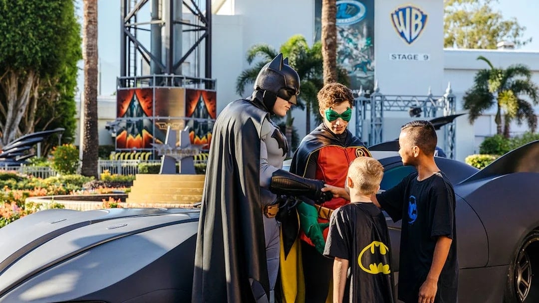 Batman and Robin greet children at Warner Bros Movie World, Gold Coast.