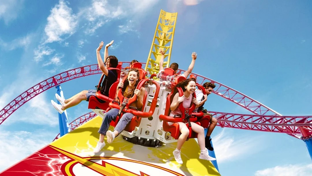 Visitors enjoying a roller coaster ride at Warner Bros Movie World, Gold Coast.