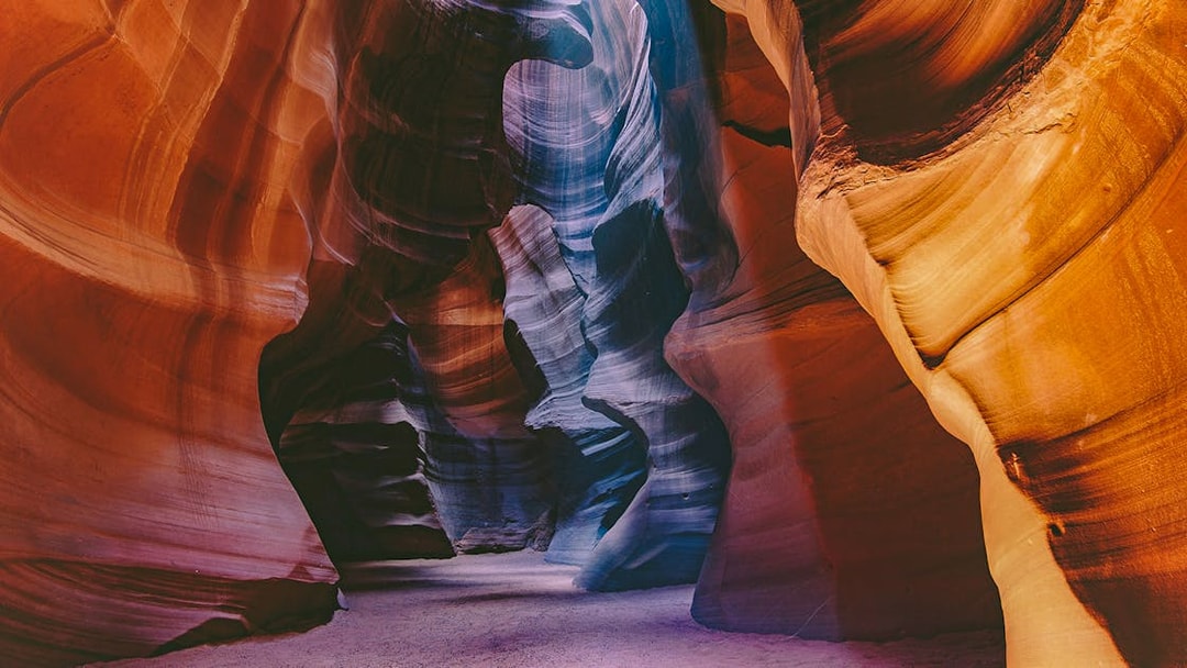 Upper Antelope Canyon's swirling sandstone walls in vibrant colors.