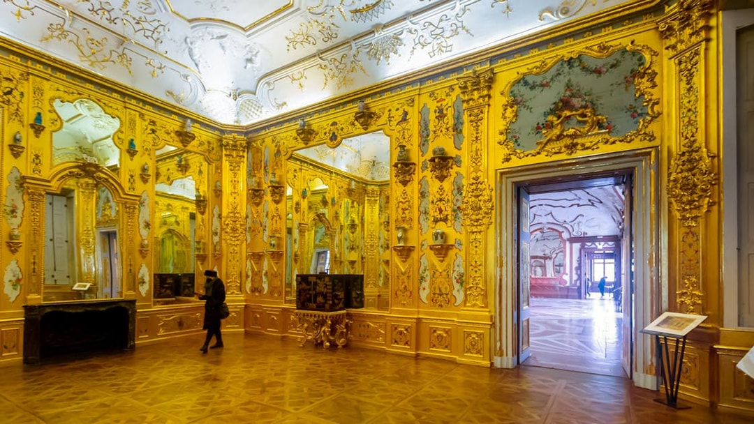 Upper Belvedere Palace ornate golden room interior, Vienna guided tour.