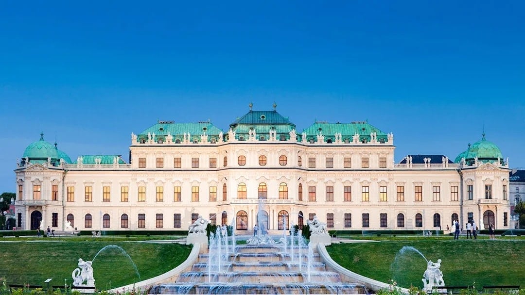Upper Belvedere Palace in Vienna with fountains and gardens in the foreground.