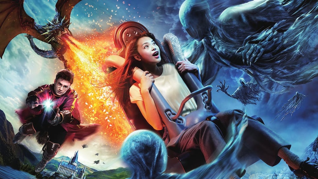 Visitor on Harry Potter and The Forbidden Journey ride at USJ with magical creatures.