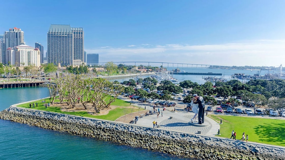 USS Midway Museum view with Unconditional Surrender statue in San Diego, California.