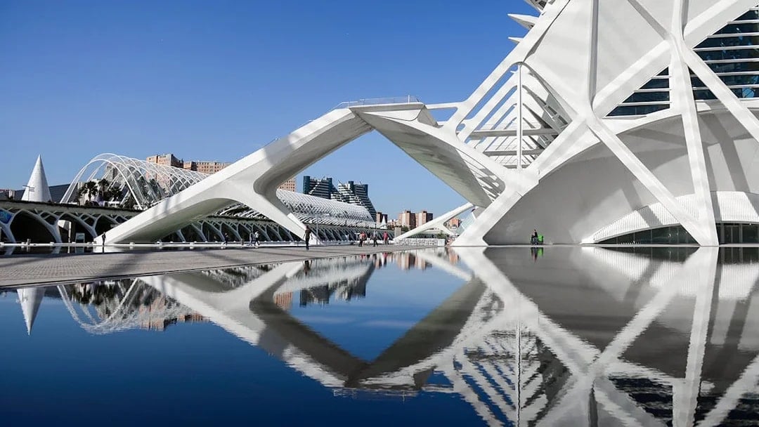 Valencia's City of Arts and Sciences architecture reflected in water.