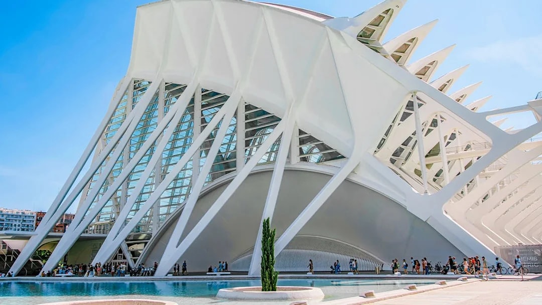 Valencia Science Museum exterior with visitors and modern architecture.