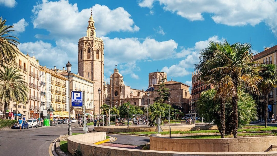 Valencia Cathedral and Plaza de la Reina on a sunny day, part of self-guided audio tour.