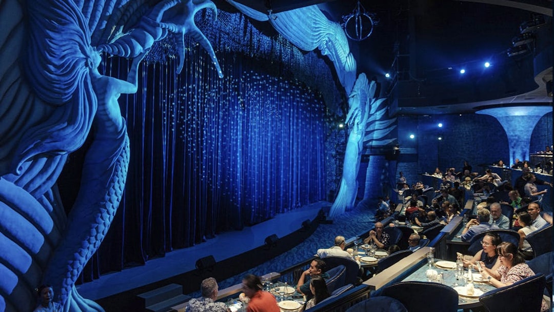 Underwater-themed dining with stage and audience at Varuna Theatrical Experience.