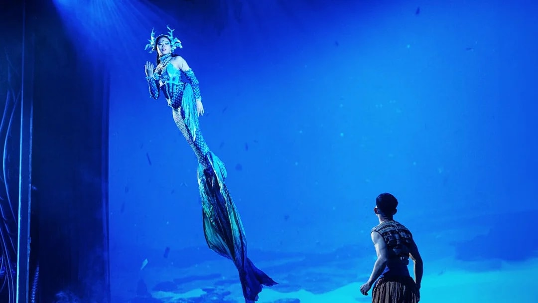 Mermaid performer in Varuna Underwater Theatrical Dining Experience.