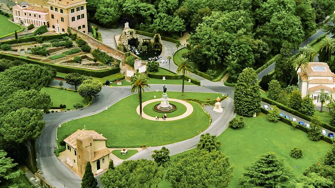 Vatican Gardens aerial view with pathways and statues, part of the Open Bus Tour with Museum Access.
