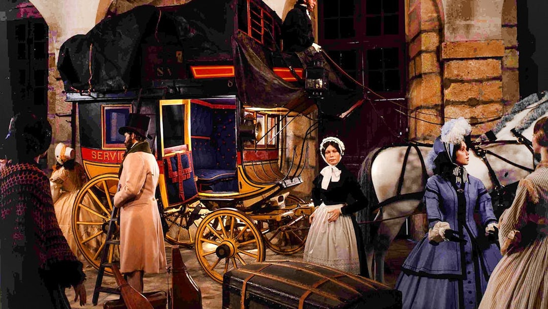 Carriage scene at Château of Vaux-le-Vicomte with period-dressed figures and horses.