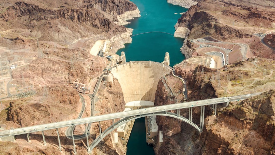 Aerial view of Hoover Dam and Colorado River Bridge, Nevada, Arizona, USA.