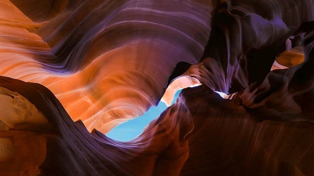 Antelope Canyon X rock formations with sunlight filtering through, Arizona.