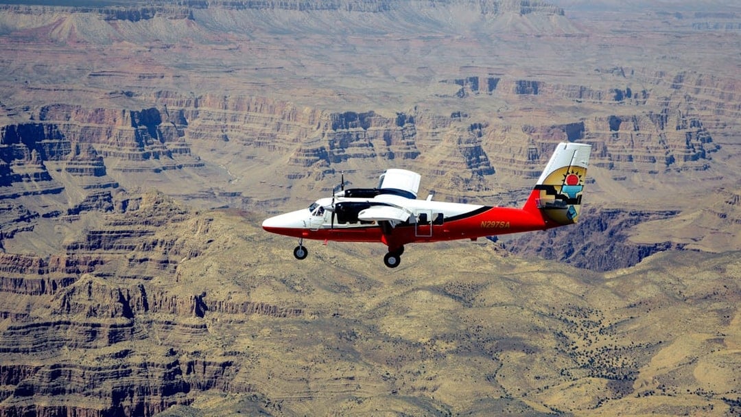 Airplane flying over the Grand Canyon during Las Vegas to Grand Canyon National Park tour.
