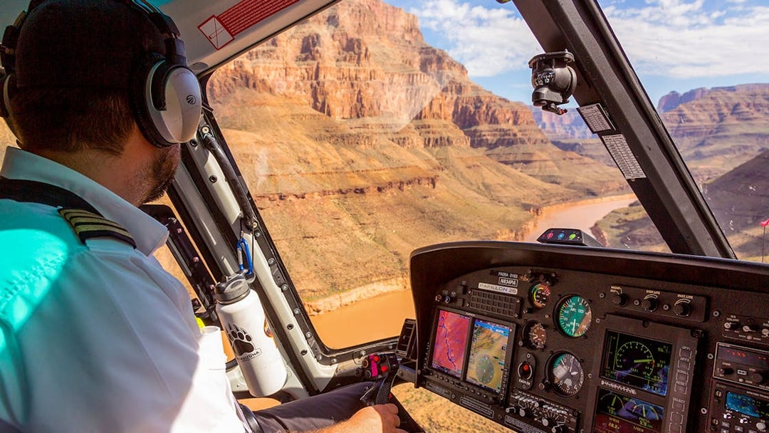 Helicopter cockpit view of Grand Canyon during Grand Celebration and Black Canyon Raft tour.