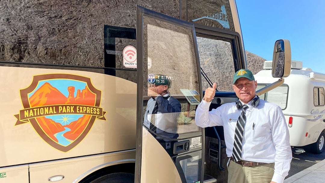 Tour guide by National Park Express bus for Antelope Canyon X and Horseshoe Bend tour.