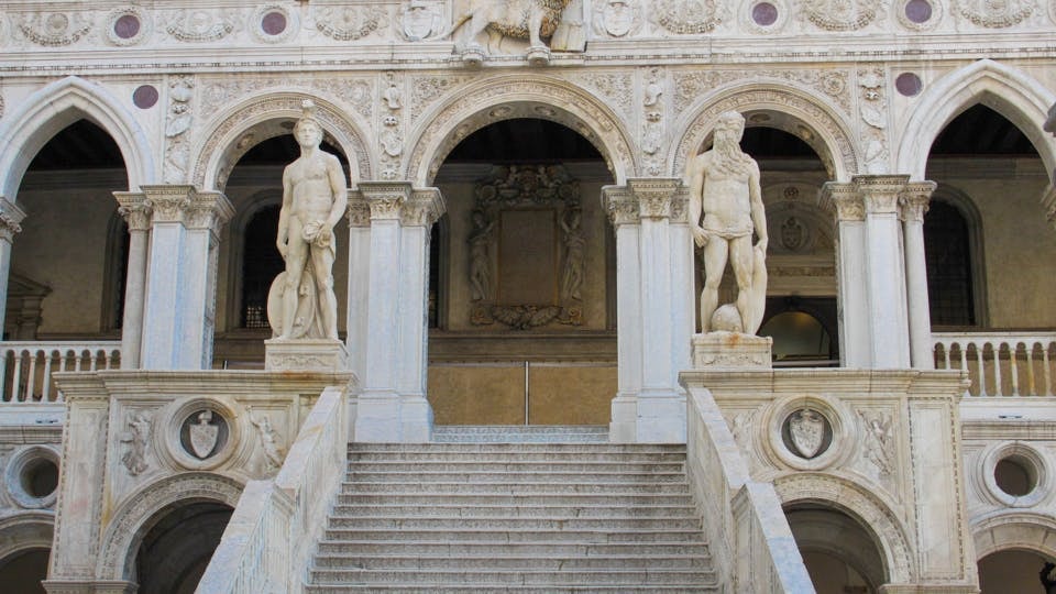 Staircase with statues at Doge’s Palace, Venice, part of 3-Museum Pass tour.