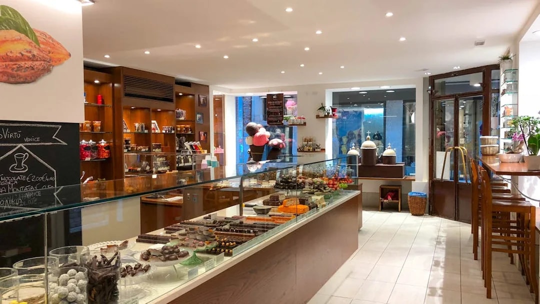 Chocolate shop interior with assorted chocolates on display in Venice.