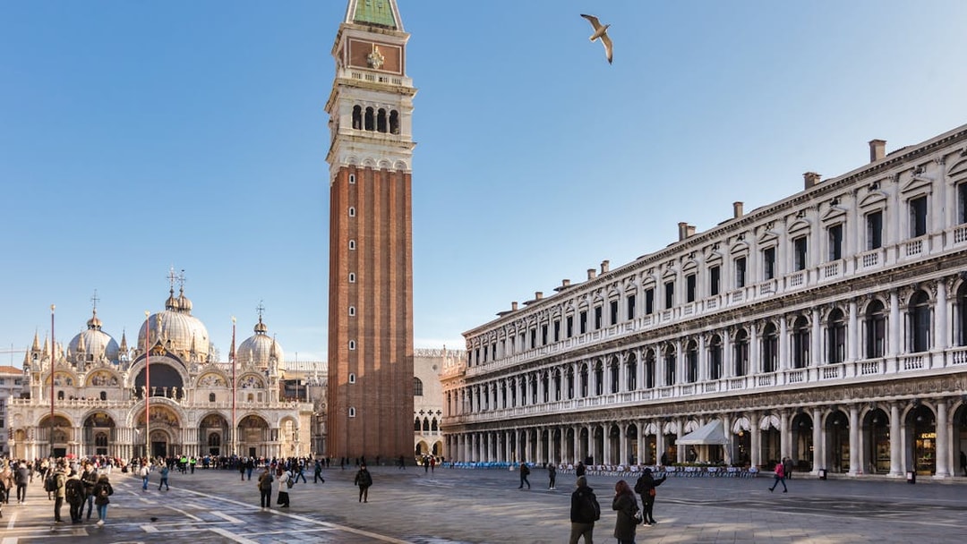 St. Mark's Square with Campanile and Basilica in Venice, Italy, during a guided walking tour.